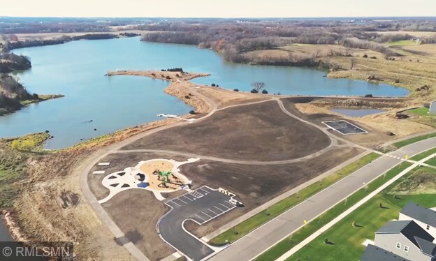 aerial overview of property's location featuring a nearby body of water