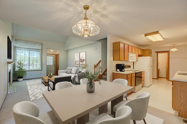 6147 Tahoe Cir Unit A, Woodbury, MN 55125 - dining room featuring a chandelier and stairway