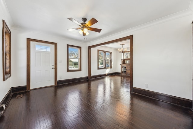 193 Griggs St N, Saint Paul, MN 55104 - entrance foyer with a chandelier, a ceiling fan, wood-type flooring, baseboards, and ornamental molding