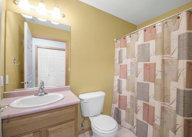 bathroom with vanity, toilet, and a shower with shower curtain