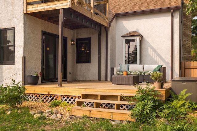 3338 Brownlow Ave, Saint Louis Park, MN 55426 - entrance to property with outdoor lounge area, stucco siding, a balcony, a shingled roof, and a wooden deck