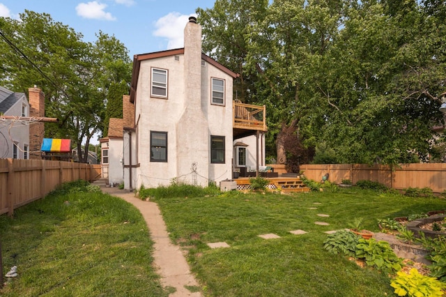 3338 Brownlow Ave, Saint Louis Park, MN 55426 - rear view of property with stucco siding, a deck, a balcony, and a chimney