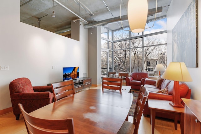 building lobby featuring a high ceiling and expansive windows