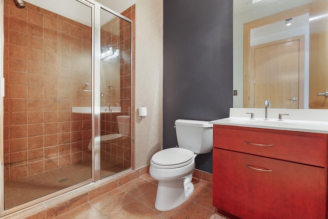 full bathroom featuring a stall shower, tile patterned flooring, and vanity