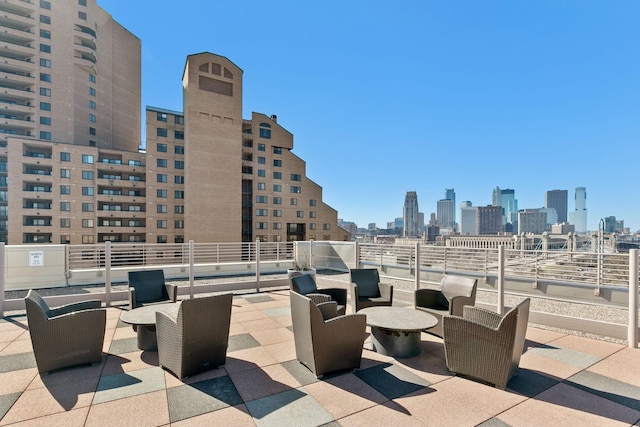 view of patio featuring a view of skyline and an outdoor hangout area