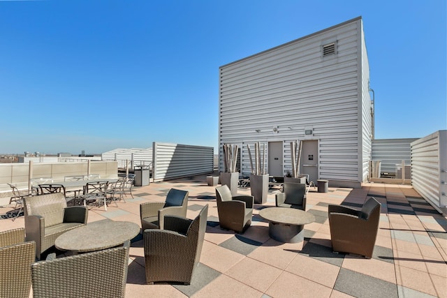 view of patio with outdoor dining area