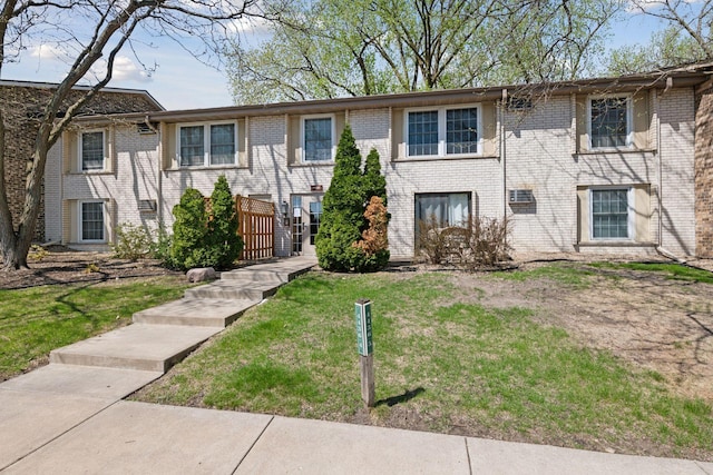4430 Cedar Lake Rd S Unit 6, Saint Louis Park, MN 55416 - view of property featuring brick siding and a front yard