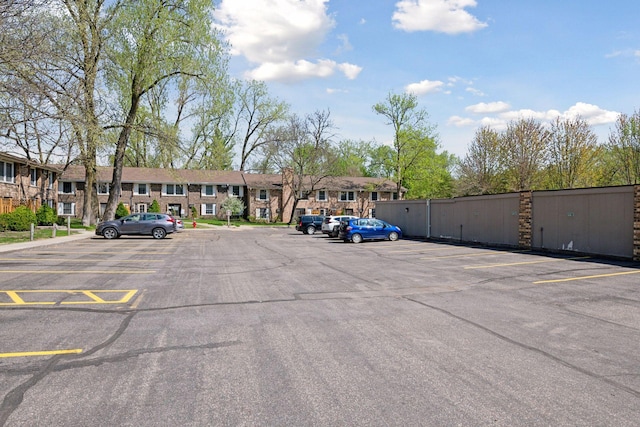 4430 Cedar Lake Rd S Unit 6, Saint Louis Park, MN 55416 - uncovered parking lot with a residential view