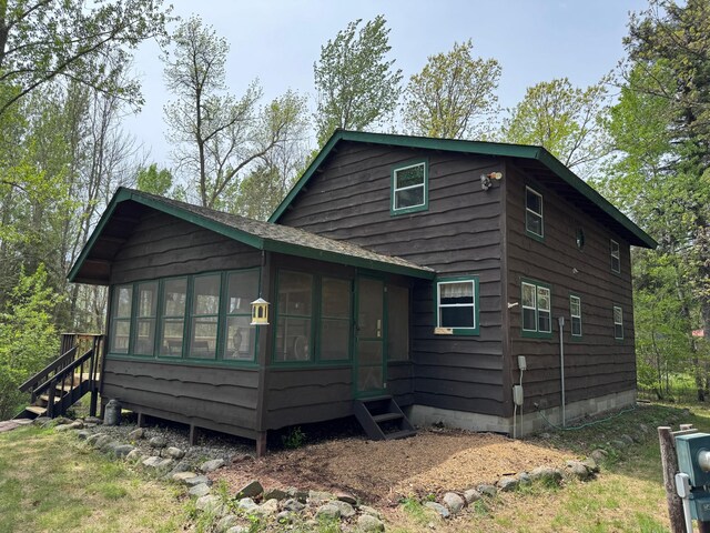 27721 Northwoods Dr, Laporte, MN 56461 - view of front of home featuring a sunroom and stairway