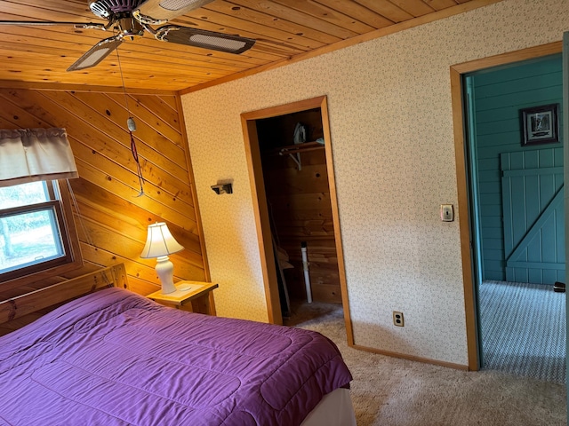 27721 Northwoods Dr, Laporte, MN 56461 - bedroom with wood ceiling, carpet, wallpapered walls, and a closet