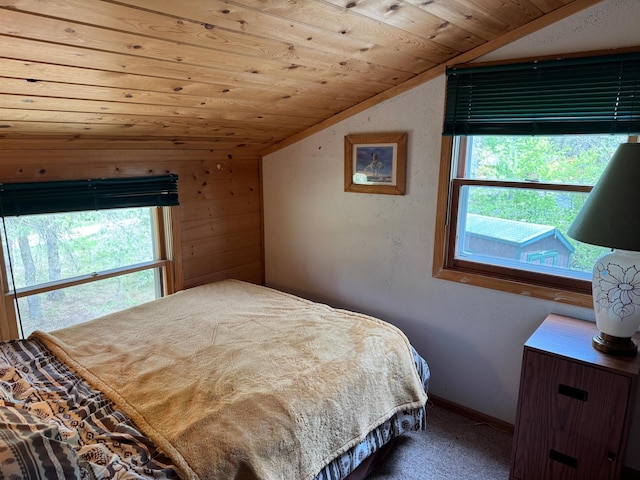 27721 Northwoods Dr, Laporte, MN 56461 - carpeted bedroom featuring lofted ceiling, wooden ceiling, and baseboards