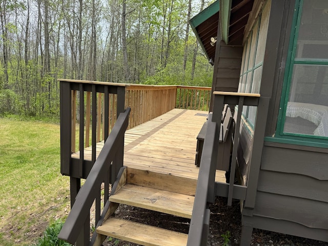 27721 Northwoods Dr, Laporte, MN 56461 - wooden deck featuring a view of trees and a lawn