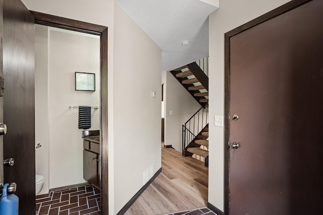 1940 Dupont Ave S, Minneapolis, MN 55403 - corridor with stairway and baseboards