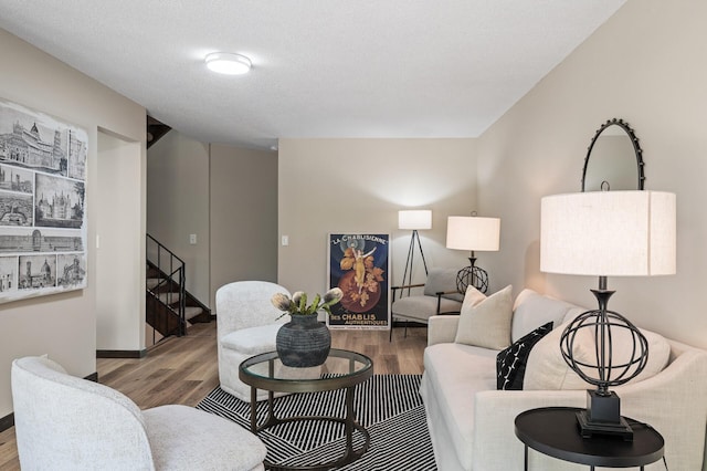 1940 Dupont Ave S, Minneapolis, MN 55403 - living room with wood finished floors, stairs, and baseboards
