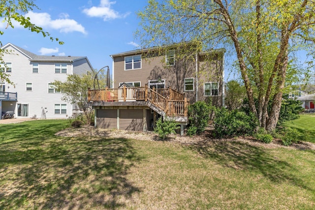 back of property featuring stairs, a deck, and a yard