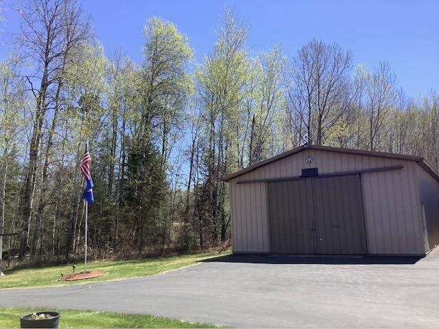19323 Wendigo Park Rd, Harris Twp, MN 55744 - view of outbuilding featuring an outdoor structure