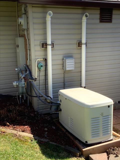 19323 Wendigo Park Rd, Harris Twp, MN 55744 - exterior view of a power unit, electric meter, and gas meter