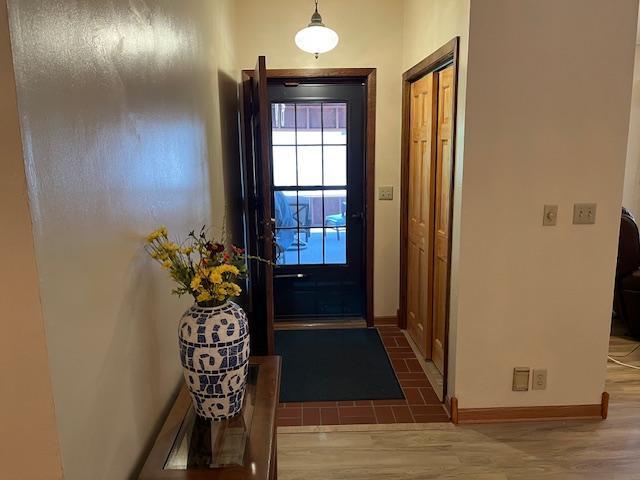 19323 Wendigo Park Rd, Harris Twp, MN 55744 - entryway with wood finished floors and baseboards