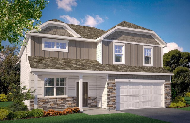 view of front facade featuring a garage, stone siding, and board and batten siding