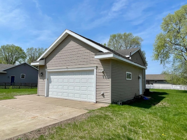 view of property exterior featuring a detached garage