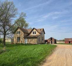 31190 181st, New Prague, MN 56071 - traditional home with dirt driveway and a front yard