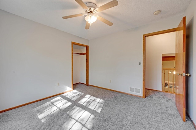 771 County Road B2 E, Little Canada, MN 55117 - unfurnished bedroom with carpet, baseboards, and a ceiling fan
