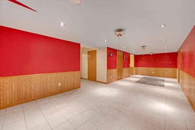 771 County Road B2 E, Little Canada, MN 55117 - spare room featuring wainscoting, wooden walls, and recessed lighting