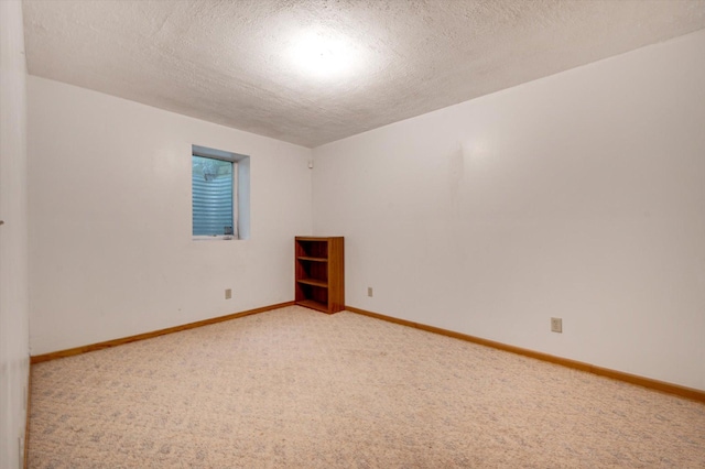 771 County Road B2 E, Little Canada, MN 55117 - empty room featuring a textured ceiling, light carpet, and baseboards