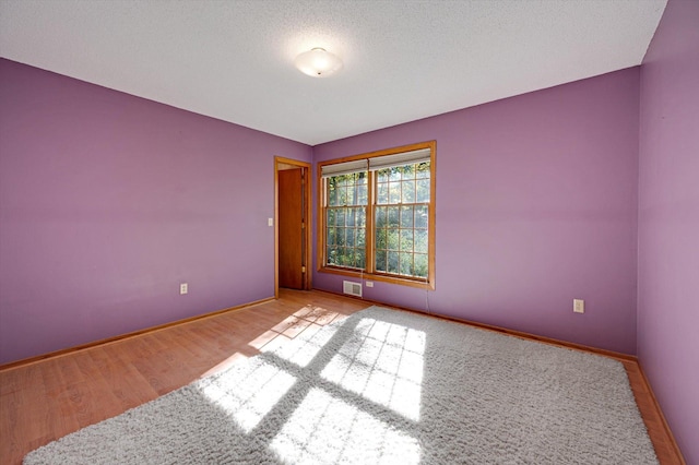 771 County Road B2 E, Little Canada, MN 55117 - unfurnished room with wood finished floors and baseboards