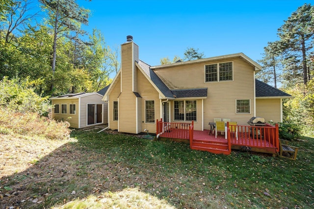 771 County Road B2 E, Little Canada, MN 55117 - rear view of property with roof with shingles, a lawn, a chimney, and a deck
