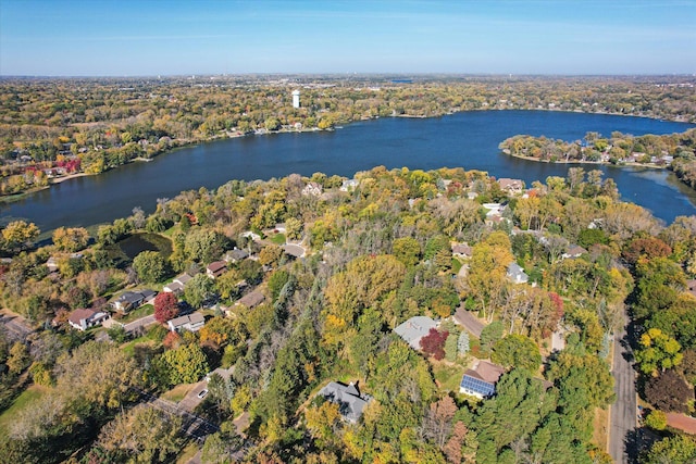 771 County Road B2 E, Little Canada, MN 55117 - aerial overview of property's location with a nearby body of water and a heavily wooded area