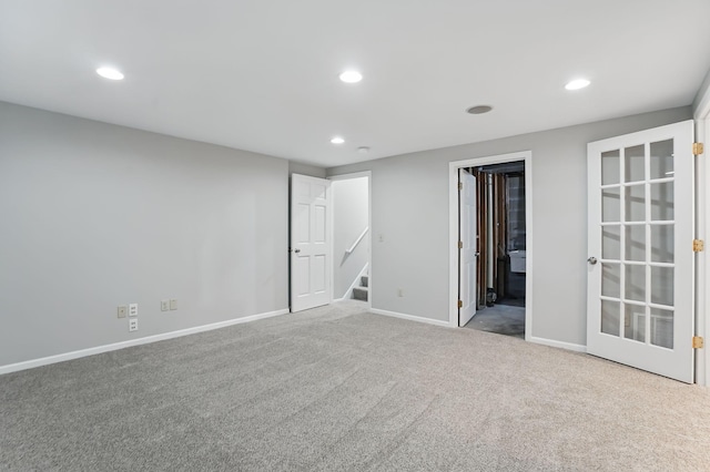unfurnished bedroom with recessed lighting, carpet, and baseboards