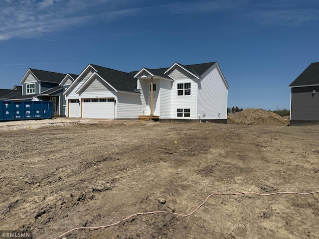 view of front of home with a garage
