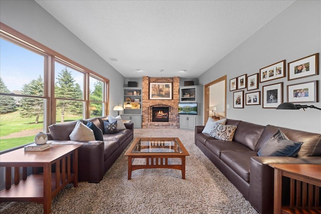 carpeted living area with a textured ceiling, built in shelves, and a brick fireplace