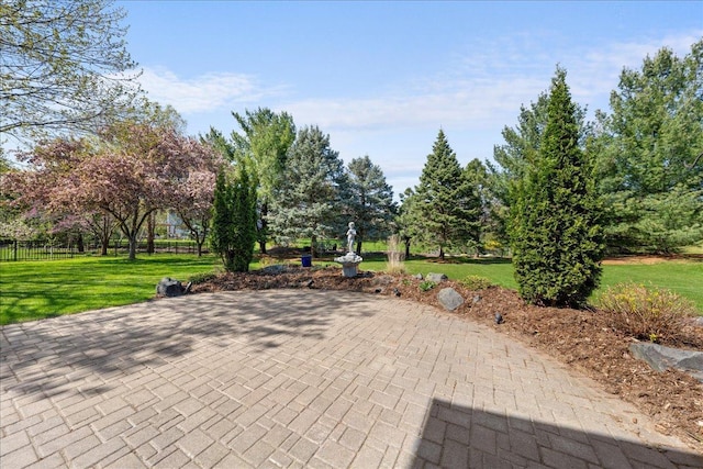 view of property's community featuring a patio