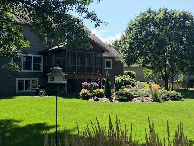 back of property featuring a sunroom