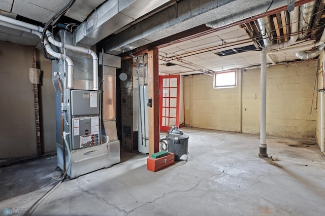 basement featuring heating unit