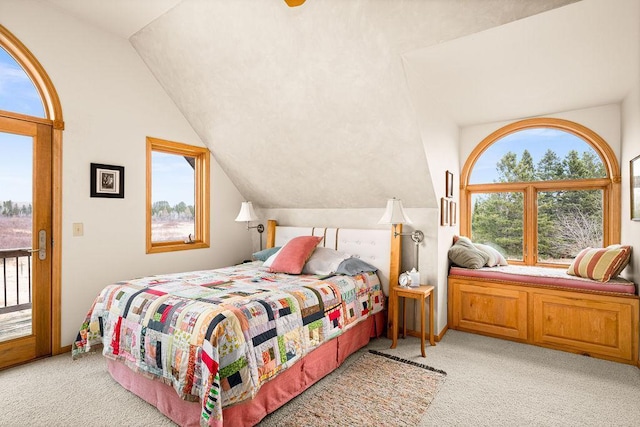 3213 Alger Grade, Silver Creek Twp, MN 55616 - bedroom with light carpet, lofted ceiling, and access to outside