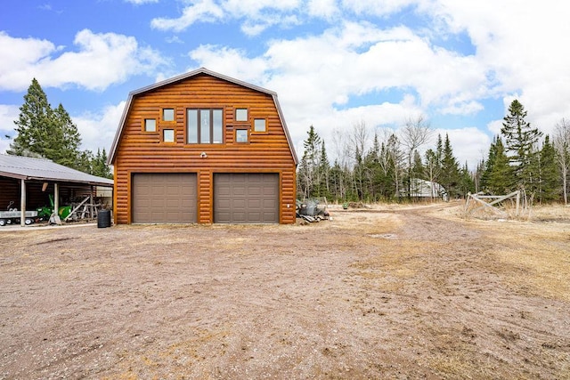 3213 Alger Grade, Silver Creek Twp, MN 55616 - garage featuring a detached garage