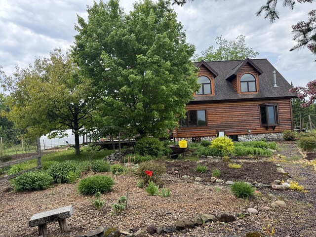 3213 Alger Grade, Silver Creek Twp, MN 55616 - view of front of house featuring a shingled roof