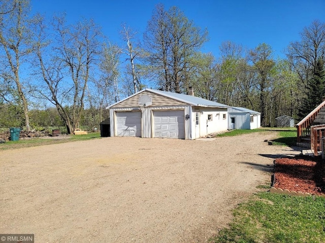 view of detached garage