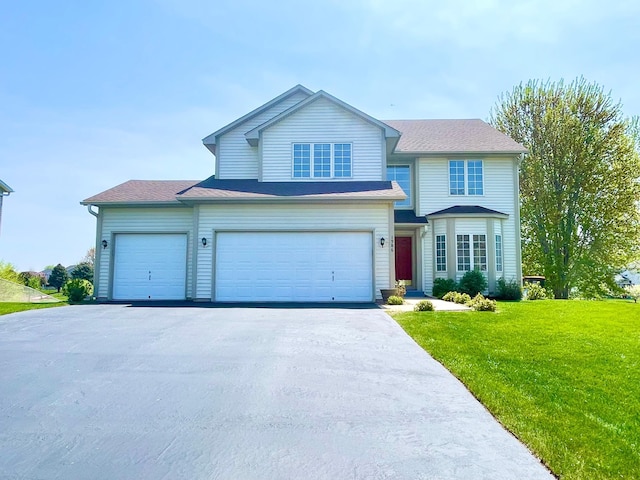 1986 Mathias Rd, Shakopee, MN 55379 - traditional home featuring driveway, a front yard, and a garage