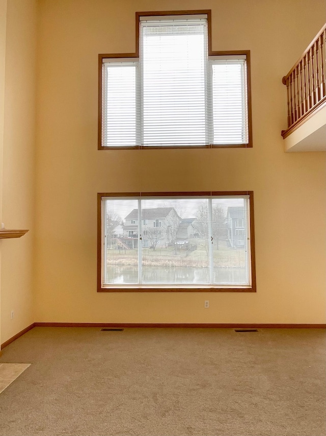 1986 Mathias Rd, Shakopee, MN 55379 - carpeted empty room with healthy amount of natural light and baseboards