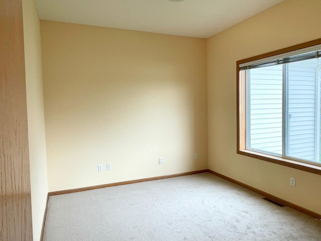 1986 Mathias Rd, Shakopee, MN 55379 - unfurnished room with light colored carpet and baseboards