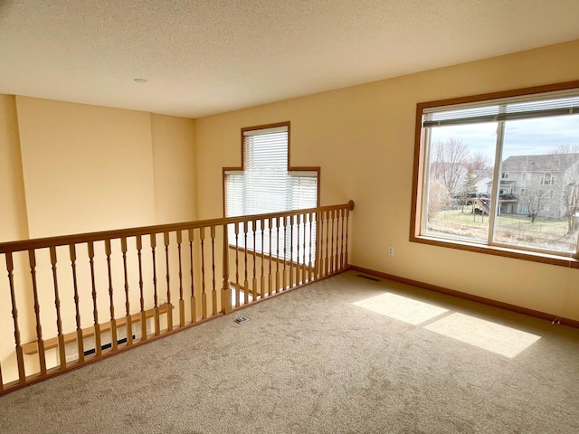 1986 Mathias Rd, Shakopee, MN 55379 - carpeted empty room featuring a textured ceiling and baseboards