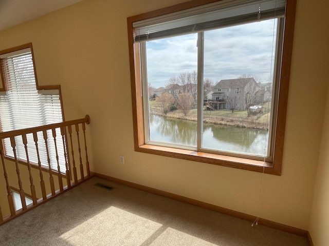 1986 Mathias Rd, Shakopee, MN 55379 - carpeted spare room featuring a water view and baseboards