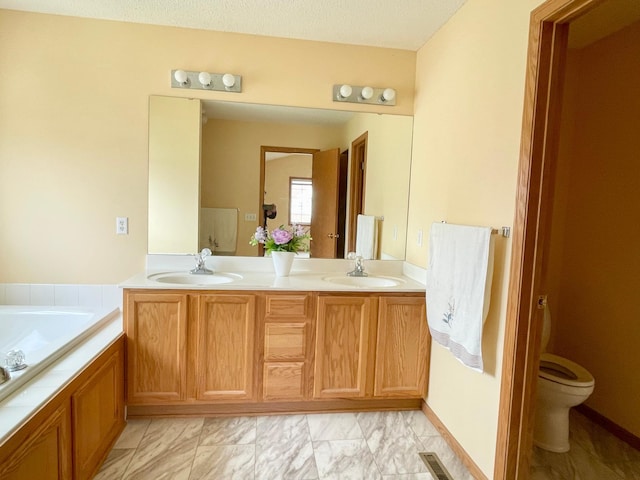 1986 Mathias Rd, Shakopee, MN 55379 - full bathroom featuring double vanity, toilet, a bath, and marble finish flooring