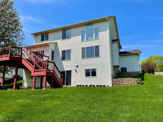 1986 Mathias Rd, Shakopee, MN 55379 - rear view of house with stairway, a deck, and a lawn