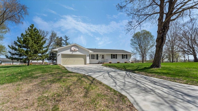 ranch-style house featuring an attached garage, concrete driveway, and a front lawn