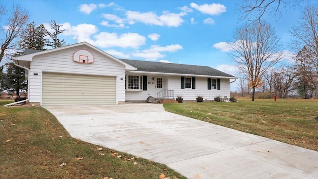 ranch-style house featuring concrete driveway, an attached garage, and a front lawn